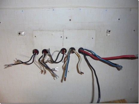 old fuse box removed, bare wires